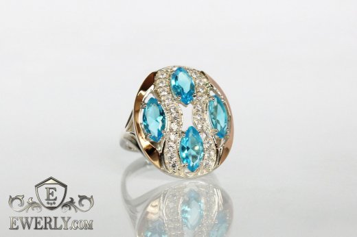 Купить женское кольцо из серебра со светло-голубыми камнями